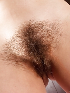 Charlotte Is A Real Curvaceous Beauty. Watch Her Smile Pleasantly As She Teases The Cam With Her Puffy Pussy Lips, Surrounded By A Thick Black Beaver.