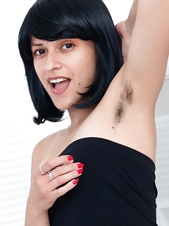 Andy Moon Is Exploring Off Her Black Blouse And Blue Miniskirt