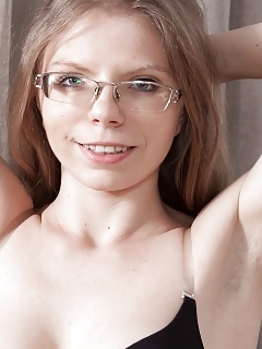 Ekaterina Ananasova Sits At Her Table Reading And Exhibiting Off Her Panties Up Her Skirt