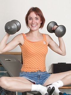 Ruby Rose Enjoys A Precious Exercise And Does It In Her Orange Blouse And Blue Jean Shorts