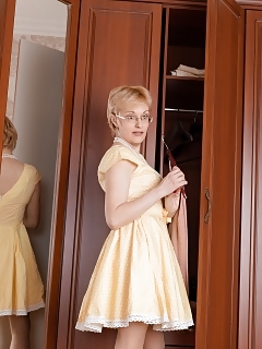 Provocative Barb Lifts Her Dress Enough To Reveal Her Tender Red Hairy Cunt To The World