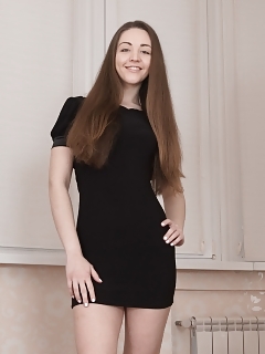 Cherry Blush Has On Her Yellow Dress With A Black Miniskirt And Nylons