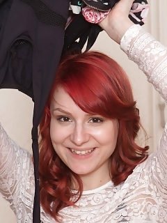 Milly Stands In Her Hallway, Revealing Off Her Physique In Her Black Miniskirt