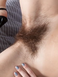 Atisha Is Flowering Her Plants In Her Brown Dress