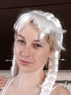 Natinella Is Stripping In Her Kitchen And Trying On A Few Different Wigs