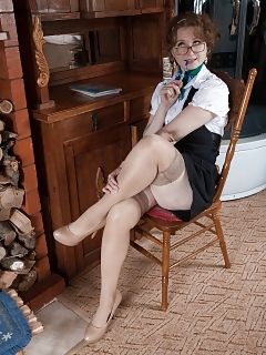 Bazhena Is Relaxing By Her Fireplace And Slipping Off Her Dress, Underwear, And Nylons