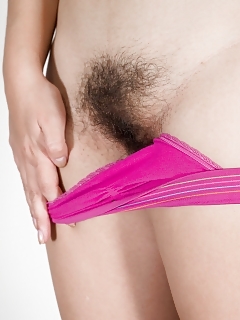 A Dark Dress Covers Up Anastasia Cherry, But She Strips To Demonstrate Her Purple Thongs And Hairy Snatch