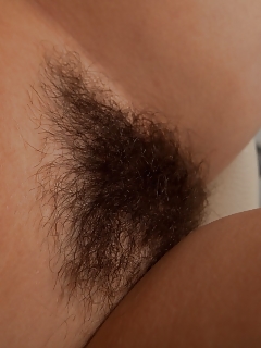 Black-haired Iveta Z Climbs Out Of Her Soft Denim Jeans And Finger Pumps Her Hairy Bush On The Cold Glass Dining Table