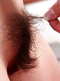 Lovely Girl Next Door Charlotte B Sits Back On The Sofa And Runs Her Fingers Through Her Dark Muff Hair After Pulling Her Icecream Panties To The Side