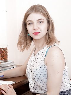 In Her Work, Kristinka Is In Her White Top And Grey Miniskirt And Pantaloons