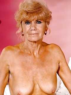 Blonde Grandma In Attractive Outfit Showcasing Bushy Box