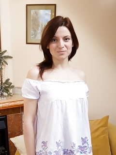 On This Cold Day Redhead Decides To Sit By The Fire Place Nude And Inspect Her Hairy Pink Taco