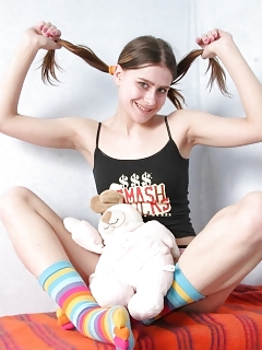 Shy Looking Girl Taking Off Her Undies